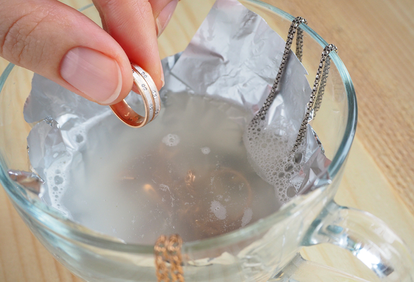 Remove discolouration from tarnished costume jewellery 